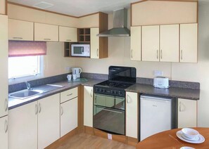 Geladeira, fogão, cooktop, torradeira
