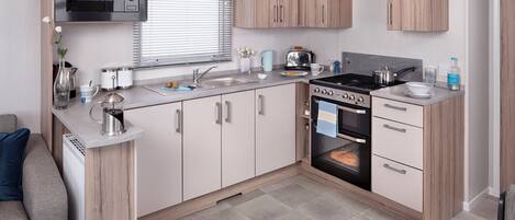 Refrigerador, horno, parrilla de estufa y tostadora