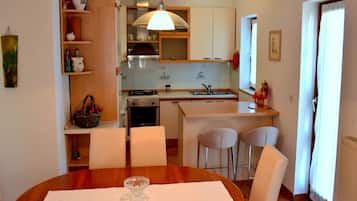 Apartment (Three Bedroom Apartment with Terrace) | Private kitchen | Fridge