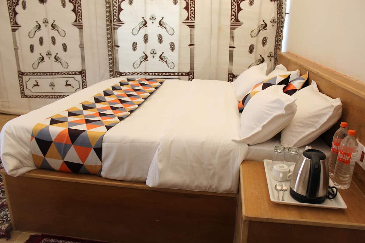 Habitación doble Deluxe | Edredón y ropa de cama