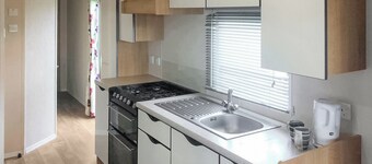 Spacious caravan with one double and two twin.