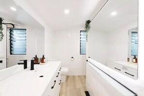 Shower, hair dryer, towels, soap