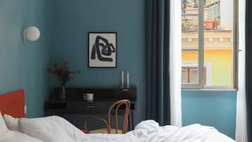 Junior Suite | 1 bedroom, in-room safe, desk, blackout curtains