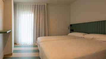 Coffres-forts dans les chambres, draps fournis