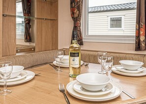Dining - 12ft-wide quality caravan with one double and two twin. (Maryport)