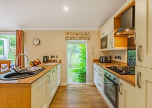 Fridge, oven, stovetop, toaster - Semi-detached deluxe lodge offering the perfect romantic retreat for couples. (Cartmel)