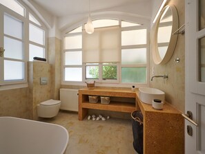 Combined shower/tub, hair dryer, towels, soap