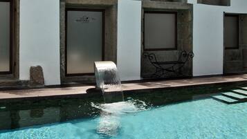 Seasonal outdoor pool, pool umbrellas, pool loungers