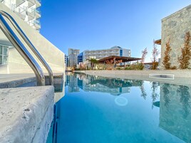 Seasonal outdoor pool, pool umbrellas, sun loungers