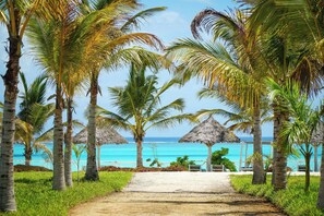 Private beach, white sand, sun-loungers, beach umbrellas