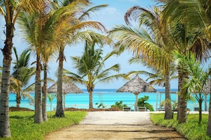 Private beach, white sand, sun-loungers, beach umbrellas