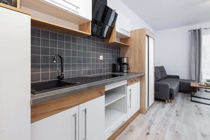 Fridge, stovetop, coffee/tea maker, toaster