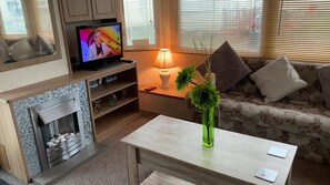 Apartment | Living area - Captivating Three Bedroom Caravan tv in Each Room (Skegness)