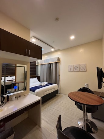 Hypo-allergenic bedding, memory foam beds, free minibar items, desk