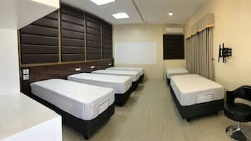 Hypo-allergenic bedding, memory-foam beds, free minibar items, desk