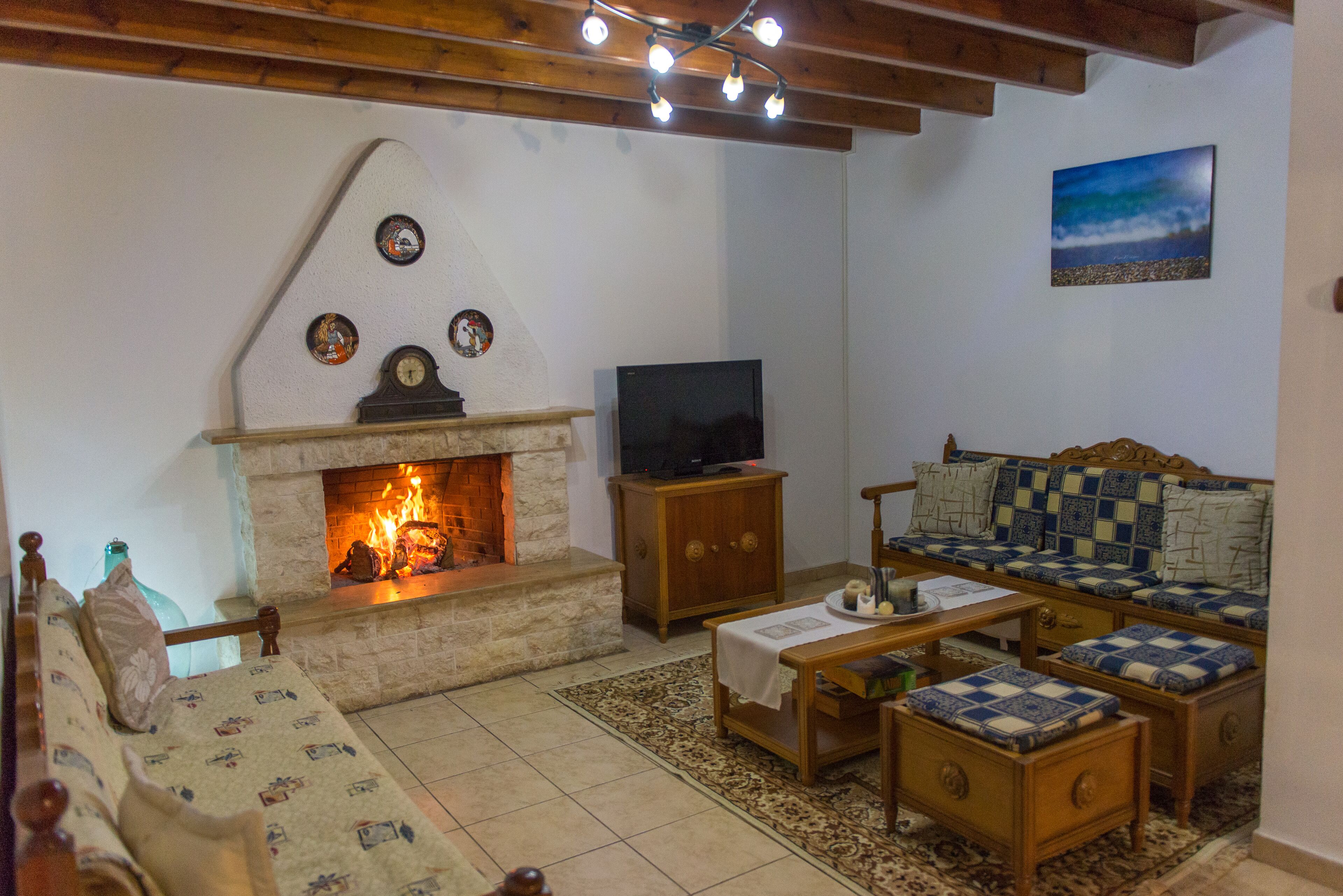 Traditional Duplex | Living area | 32-inch LED TV with digital channels, TV, fireplace