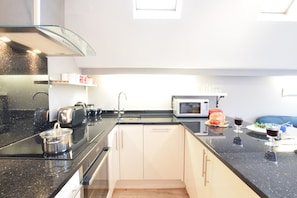 Fridge, dishwasher, cookware/dishes/utensils