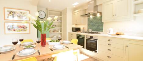 Fridge, dishwasher, cookware/dishes/utensils