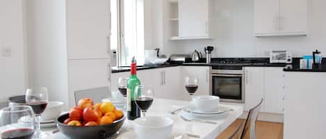 Fridge, dishwasher, cookware/dishes/utensils