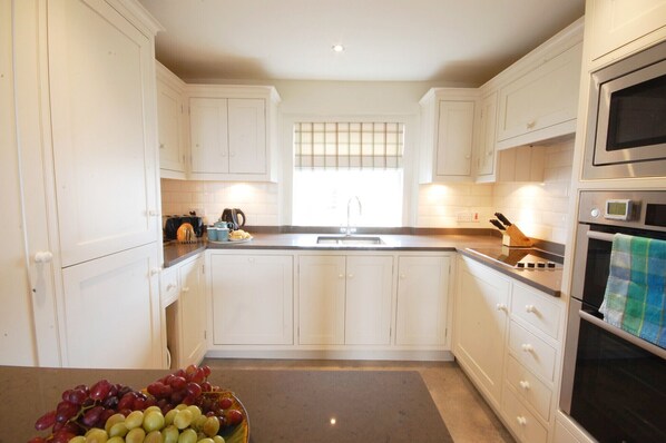 Fridge, dishwasher, cookware/dishes/utensils