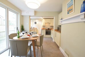 Fridge, dishwasher, cookware/dishes/utensils