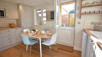 Fridge, dishwasher, cookware/dishes/utensils