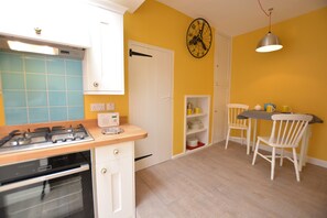 Fridge, dishwasher, cookware/dishes/utensils