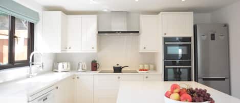 Fridge, dishwasher, cookware/dishes/utensils