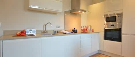 Fridge, dishwasher, cookware/dishes/utensils