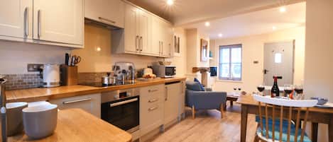 Fridge, dishwasher, cookware/dishes/utensils