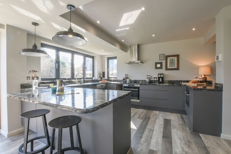 Fridge, dishwasher, cookware/dishes/utensils