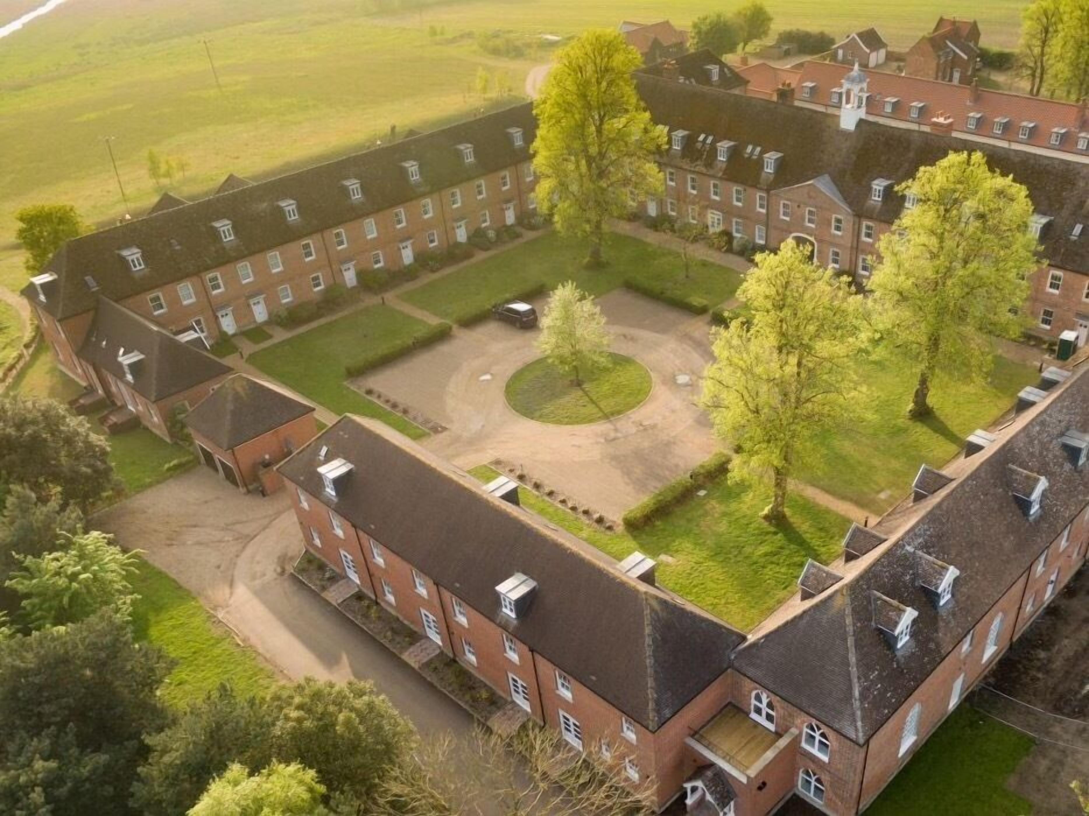 A large, rectangular building with multiple windows and a central courtyard. - The Gallery, Blythburgh (Halesworth)