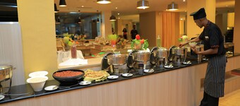 Kenenisa.. Oasis International Hotel