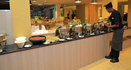 Kenenisa.. Oasis International Hotel