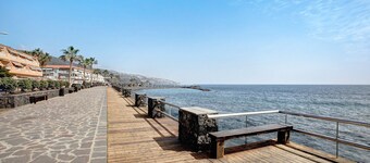 Vacation Rental 'Apartamento Caletillas Alan' with Shared Pools, Terrace, and Wi-Fi