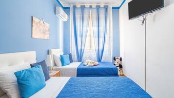 2 habitaciones, tabla de planchar con plancha y ropa de cama