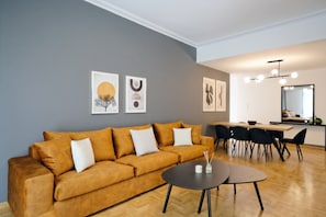 Luxury Apartment | Living area | 40-inch Smart TV with digital channels, TV, fireplace