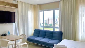 Apartment | Living area | 40-inch TV with cable channels