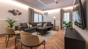 Luxury Apartment | Living area | 43-inch Smart TV with digital channels, TV