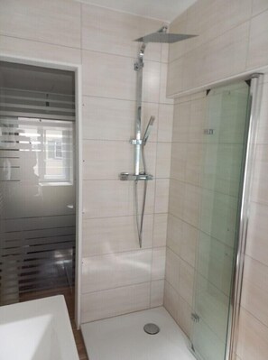 Shower, hair dryer, towels, soap