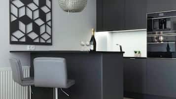 Deluxe Apartment | Private kitchen | Full-size fridge, oven, stovetop, dishwasher