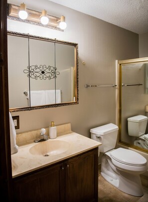 Bathtub, hair dryer, towels, soap