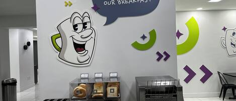 Una presentación de desayuno con un personaje de caricatura y un tostador.