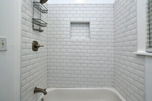 Combined shower/tub