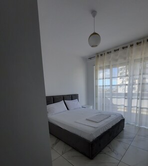 Apartment, 2 Queen-Betten | 2 Schlafzimmer, kostenloses WLAN, Bettwäsche