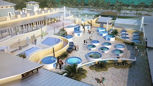 A resort with multiple swimming pools, a covered area with seating, and a view of the ocean. - Luxury Home - Jacuzzi! Mini-Golf! Ping-Pong! Pets! 2 Desks! Yoga! Beach Gear! (North Palm Beach)