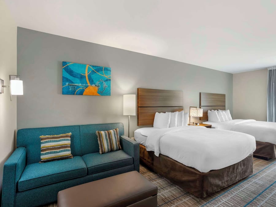 Suite, 2 Queen Beds, Non Smoking | 1 bedroom, blackout drapes, iron/ironing board, free WiFi