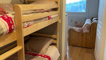 2 bedrooms, iron/ironing board, travel crib, bed sheets