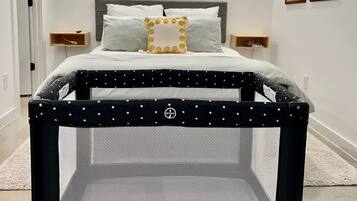 1 bedroom, desk, iron/ironing board, travel crib