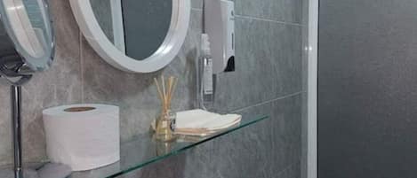 Shower, towels, soap, shampoo